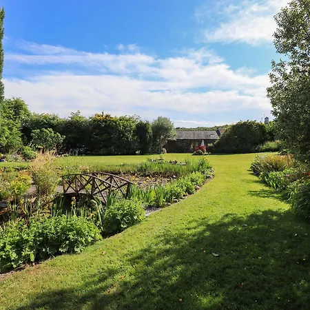 The Garden At Fiddler Hall Barn Casa de Férias *